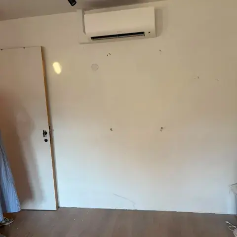 Daikin-wandmodel in een kamer in Gent